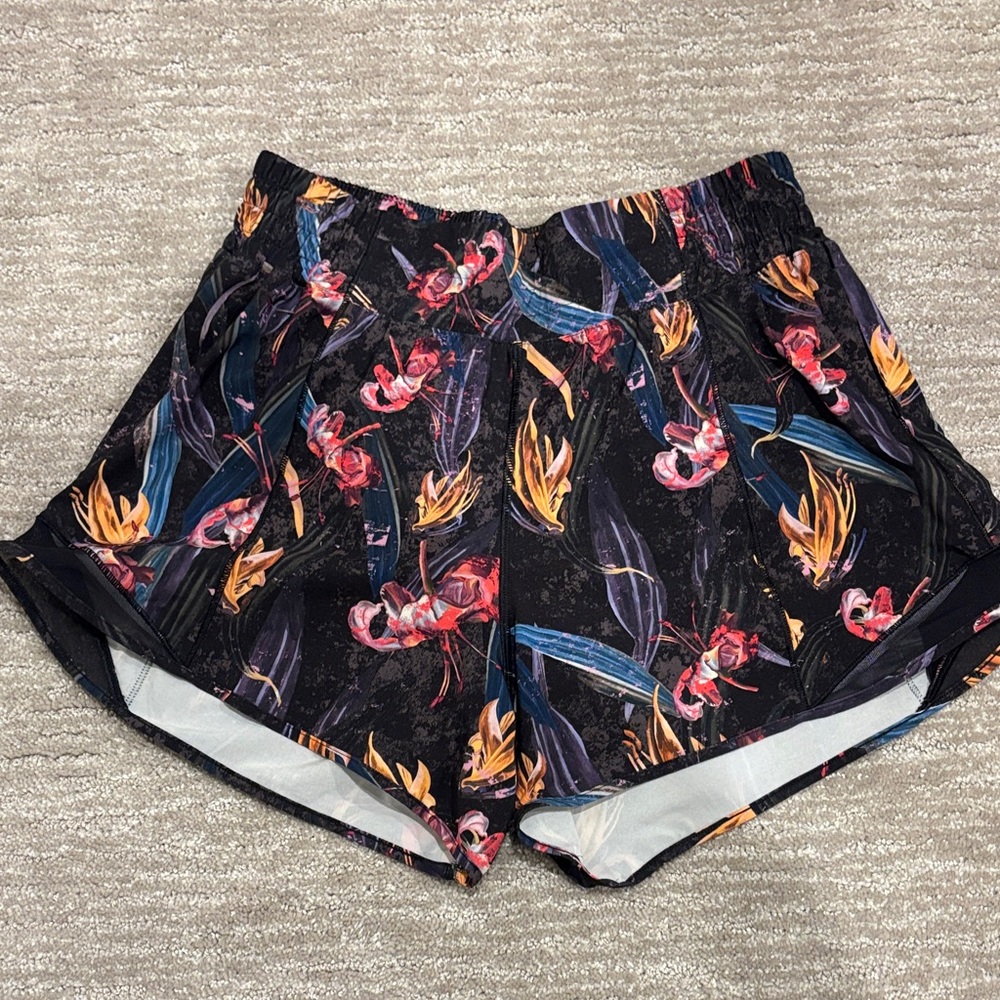 NWOT Lululemon shorts with elastic waist. 4 inch and seem size 8 multicolored.